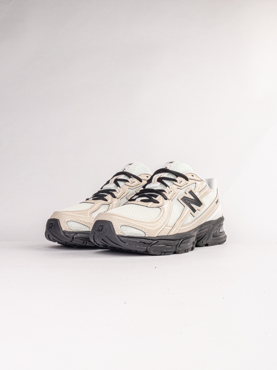 New Balance U7404OO